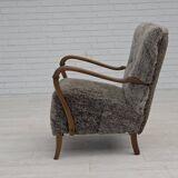 1960s, reupholstered Danish armchair, New Zealand genuine sheepskin.