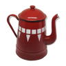 Red enamel coffee maker and graphic patterns