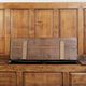 Antique English oak hall bench from the early 19th century with storage space