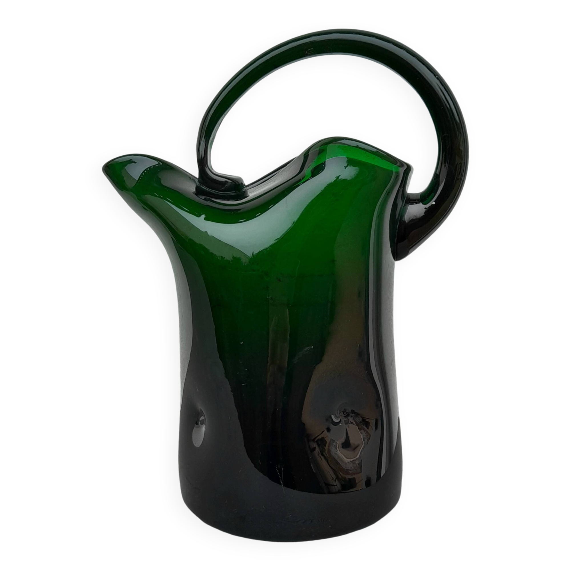 Blown glass pitcher filled