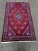 Authentic Persian carpet from Iran, hand-knotted in burgundy wool, 130x210cm.