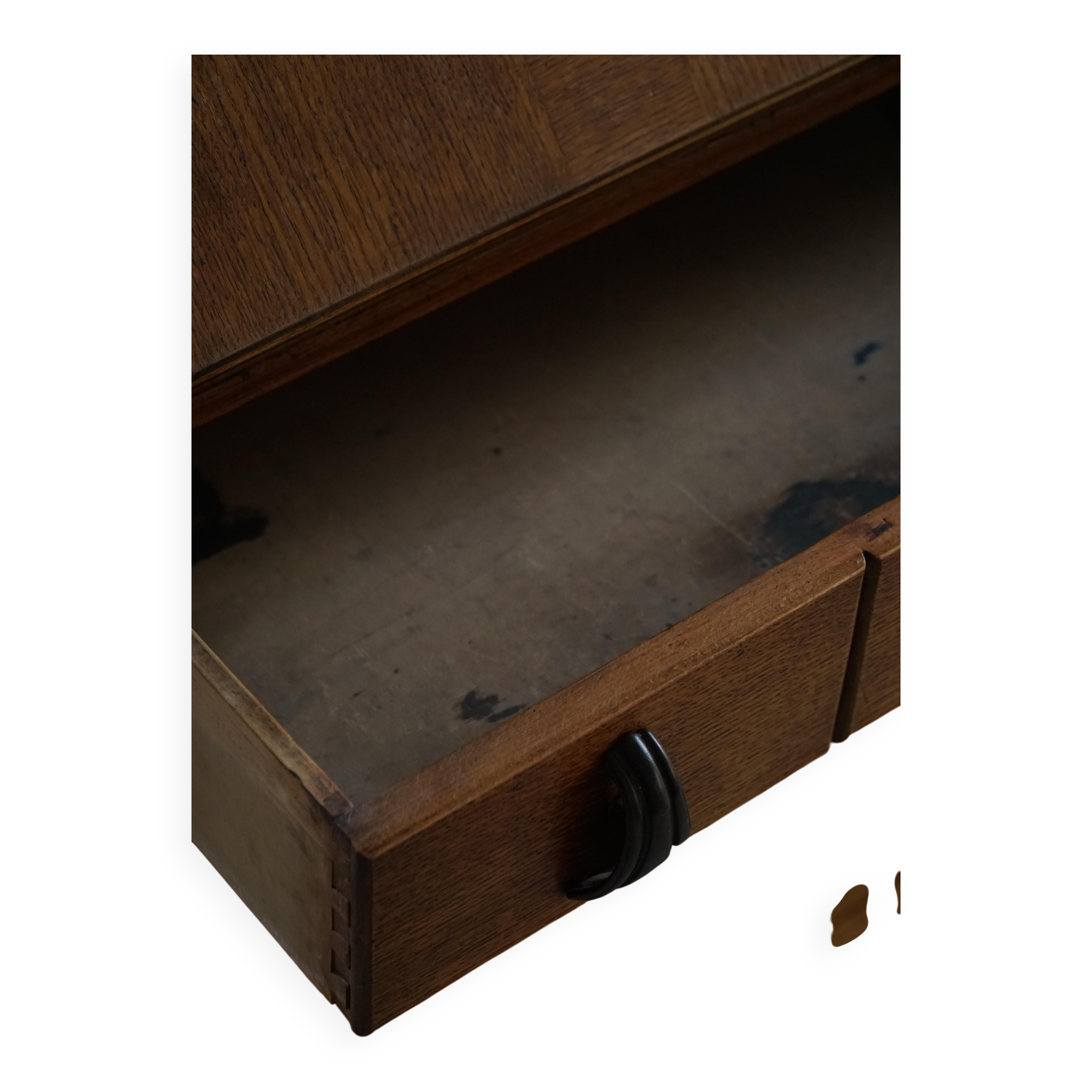 Desk / Chest of drawers in modern Danish oak from the early 20th century with shell handles.