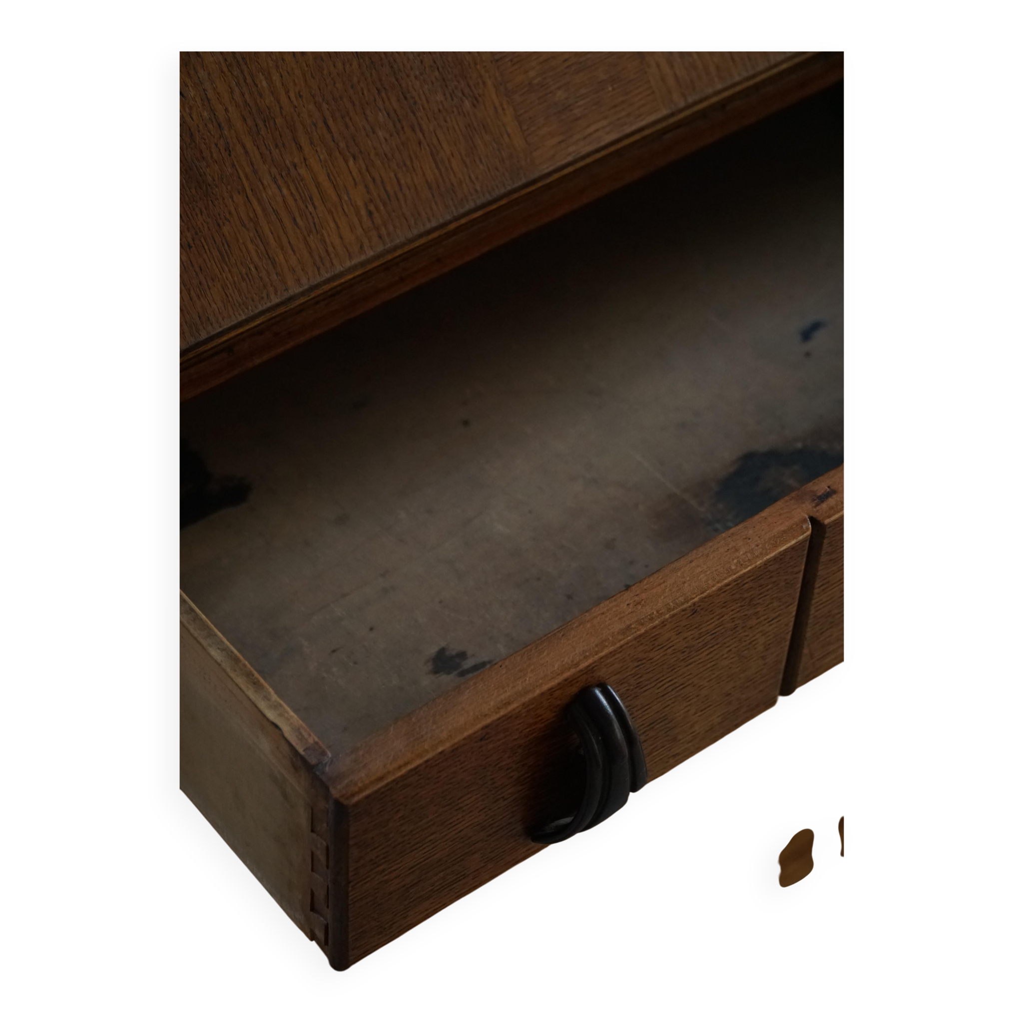 Desk / Chest of drawers in modern Danish oak from the early 20th century with shell handles.
