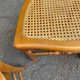 Set of 4 Louis-Philippe medallion chairs in wood with caned seats, 1970s.