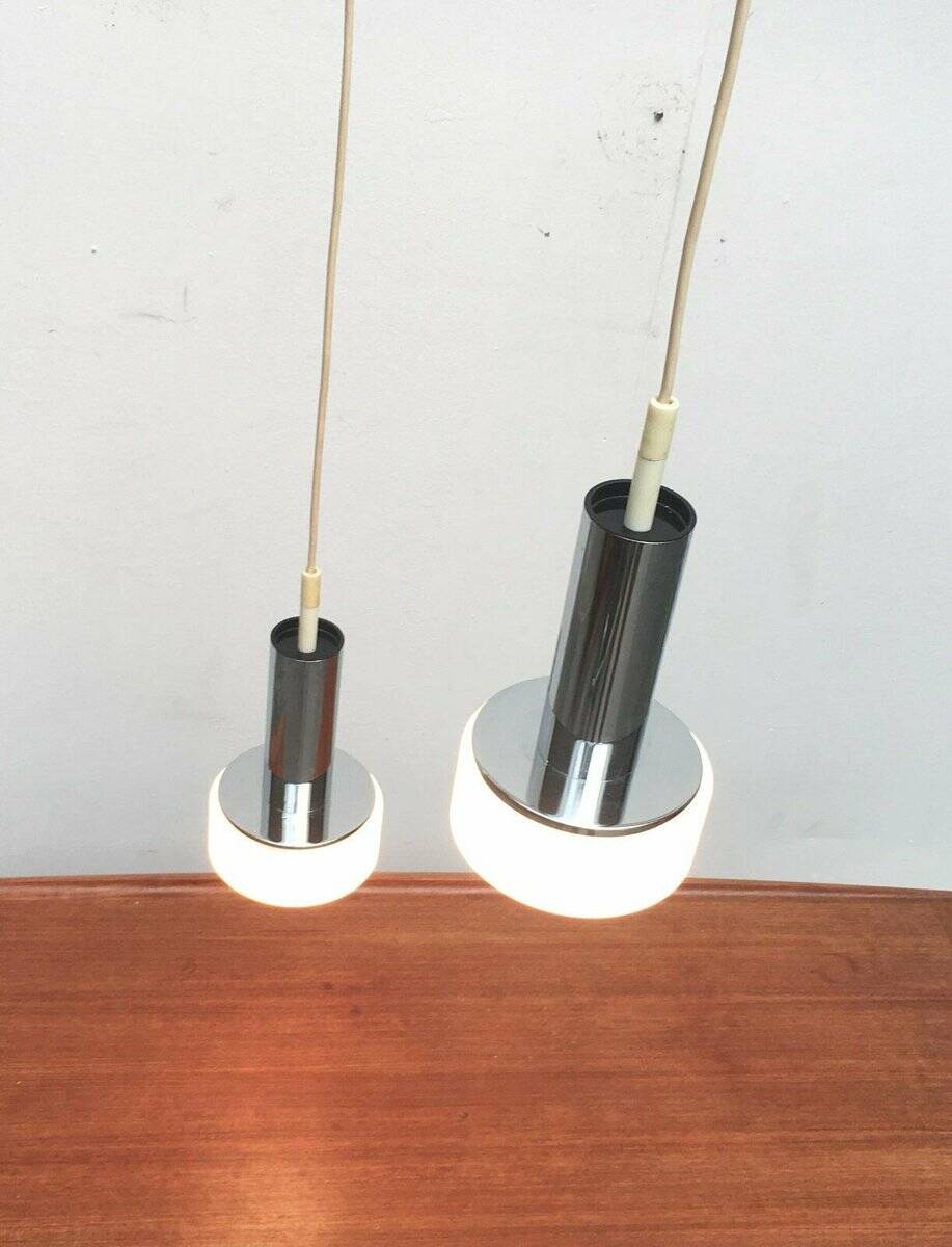 Suspended glass and chrome lamps model P105 German Mid-Century Space Age from the 1960s by Staff, set of 2.