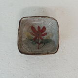 Empty pocket with vintage flower decoration