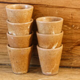 Set of 7 glasses with digestive sandstone