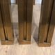 Set of 3 nesting tables in brass and glass. French work by Guy Lef.