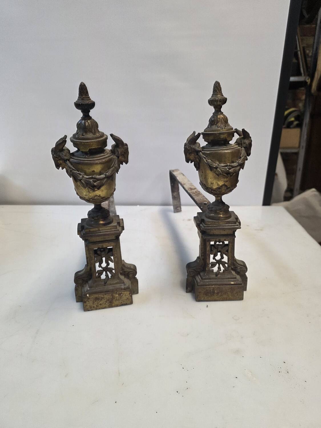 Pair of Louis XVI style andirons, 19th century in bronze