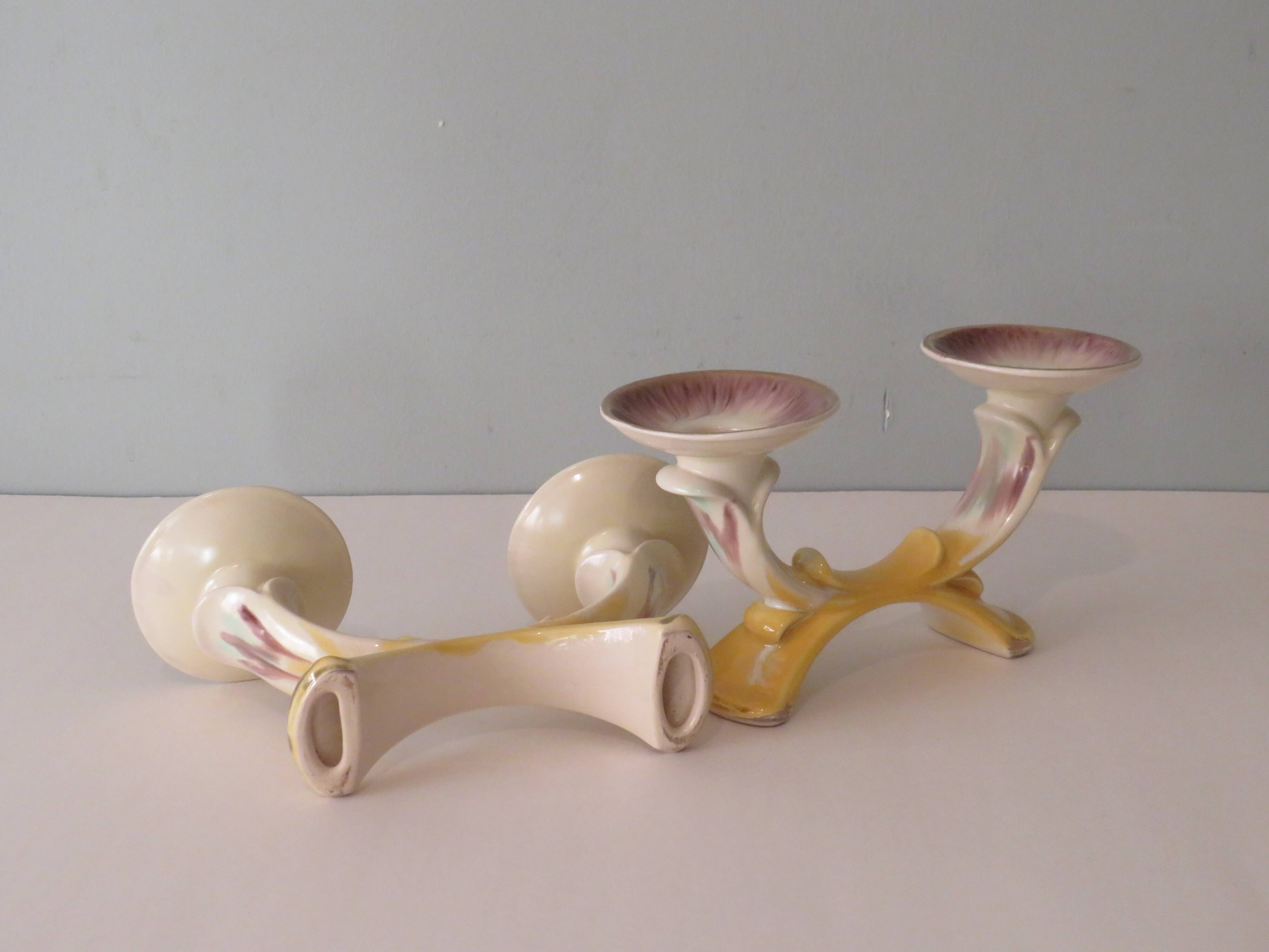 Set of 2 ceramic candle holders in the early twentieth century.