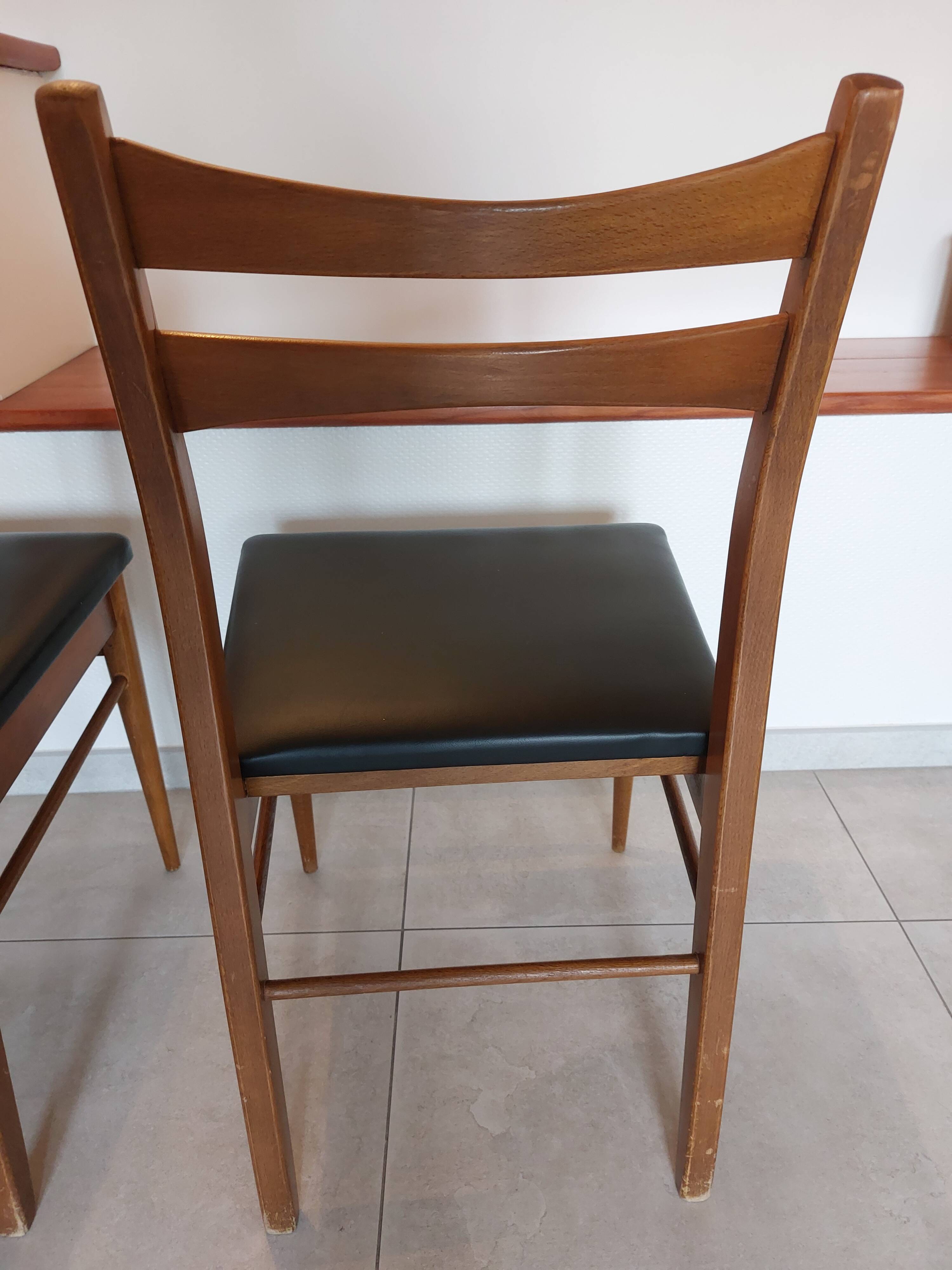 5 Scandinavian style chairs, wood and black faux leather.