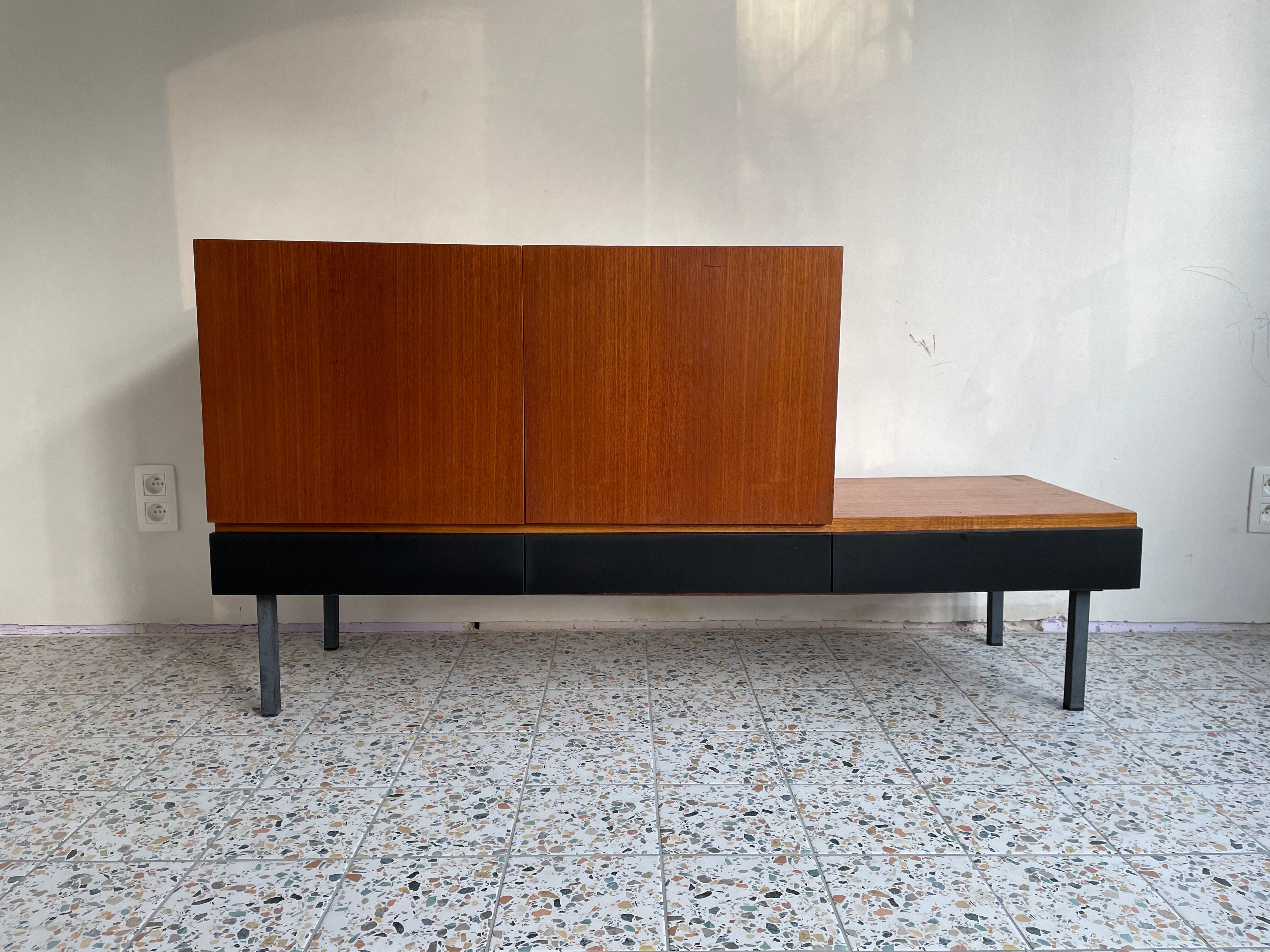 Asymmetrical vintage teak row