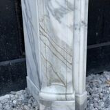 Louis XV style fireplace in white Carrara marble arabescato