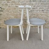 Pair of wooden and Skaï chairs from the 80s, Italy