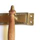 Brass and wood kitchen utensils with wall display, 60s