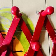 Vintage accordion coat rack in red painted wood