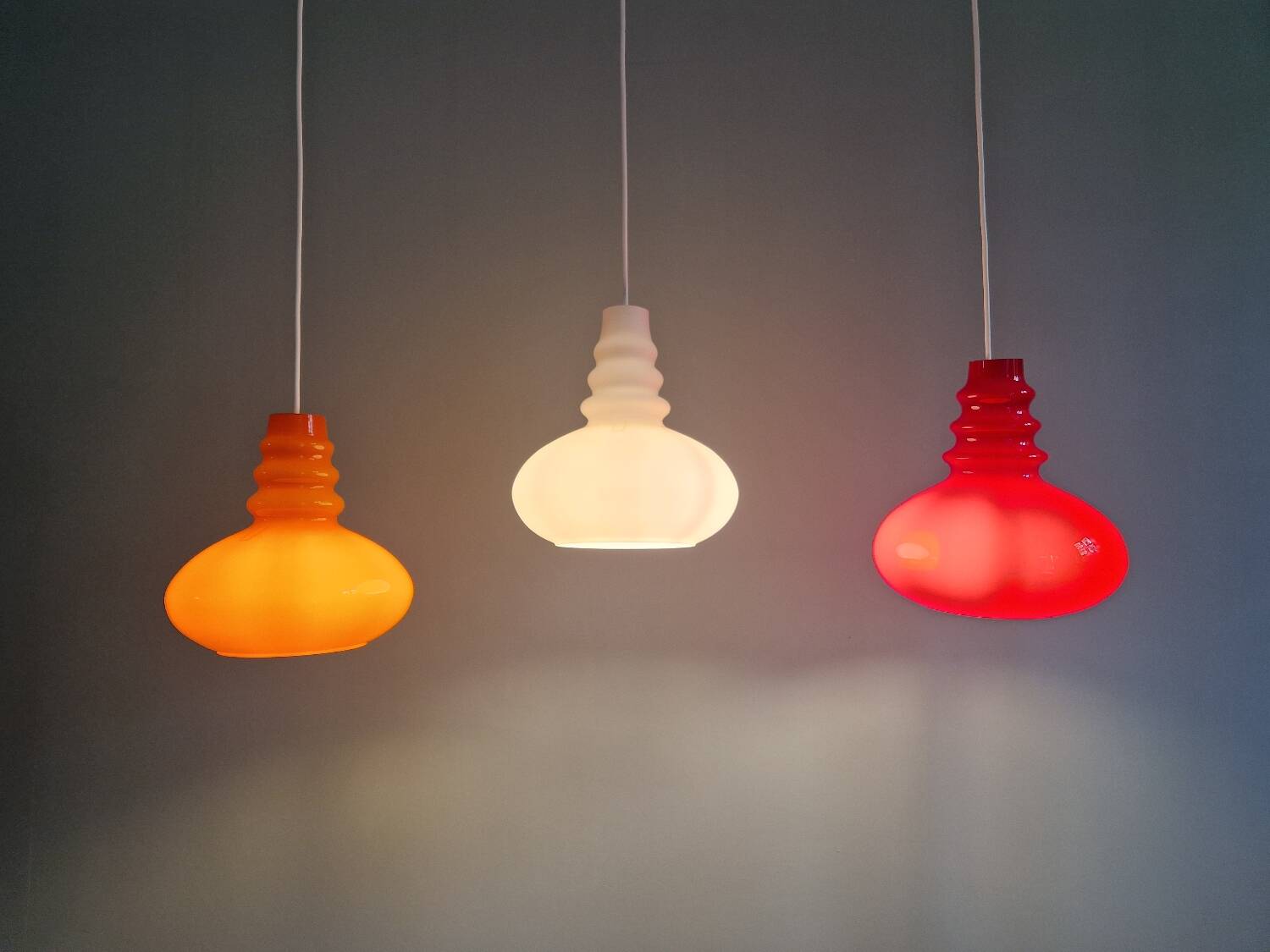 Trio of Space Age opaline pendant lights, Peill & Putzler, 1970