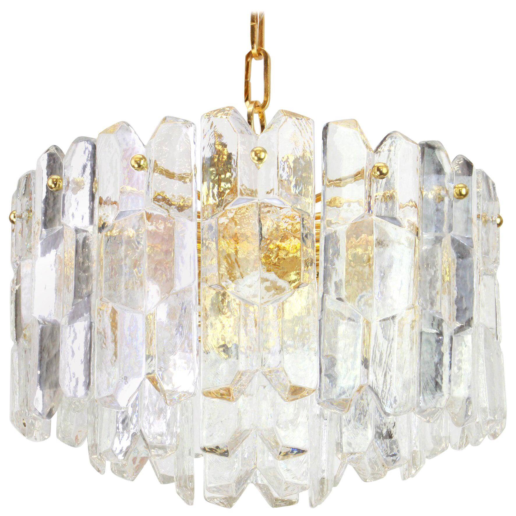 Magnificent luminaire in gilded brass and crystal glass Palazzo, Kalmar, Austria, 1970.