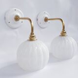 Brass and speckled glass wall lights from Clichy