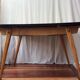 Table en bois et formica pieds compas