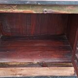 Furniture low in colorful wood. 12 drawers and 1 door