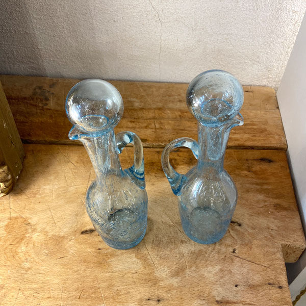 Pair of blue bubbled blown glass decanters