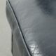 Dark blue cowhide club armchair with a unique and timeless design