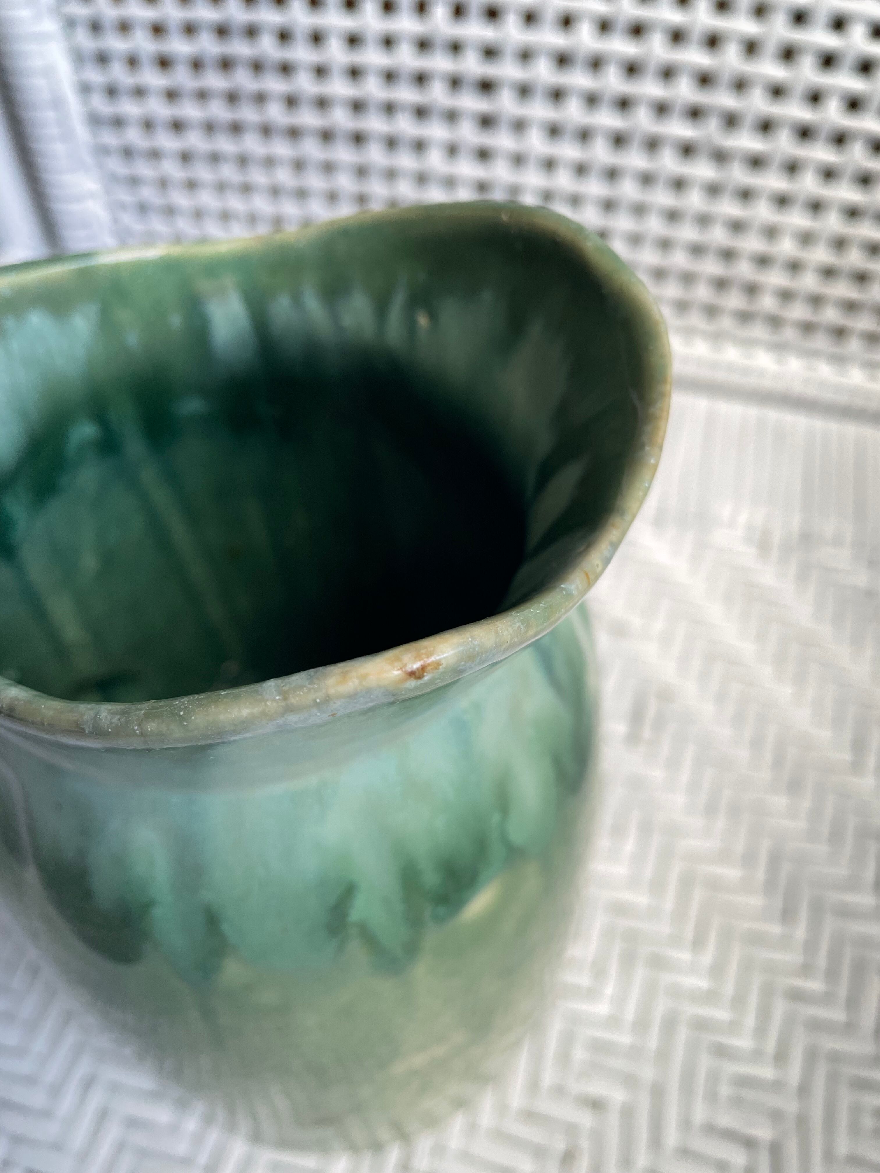 Turquoise green enamelled ceramic pitcher