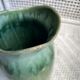 Turquoise green enamelled ceramic pitcher