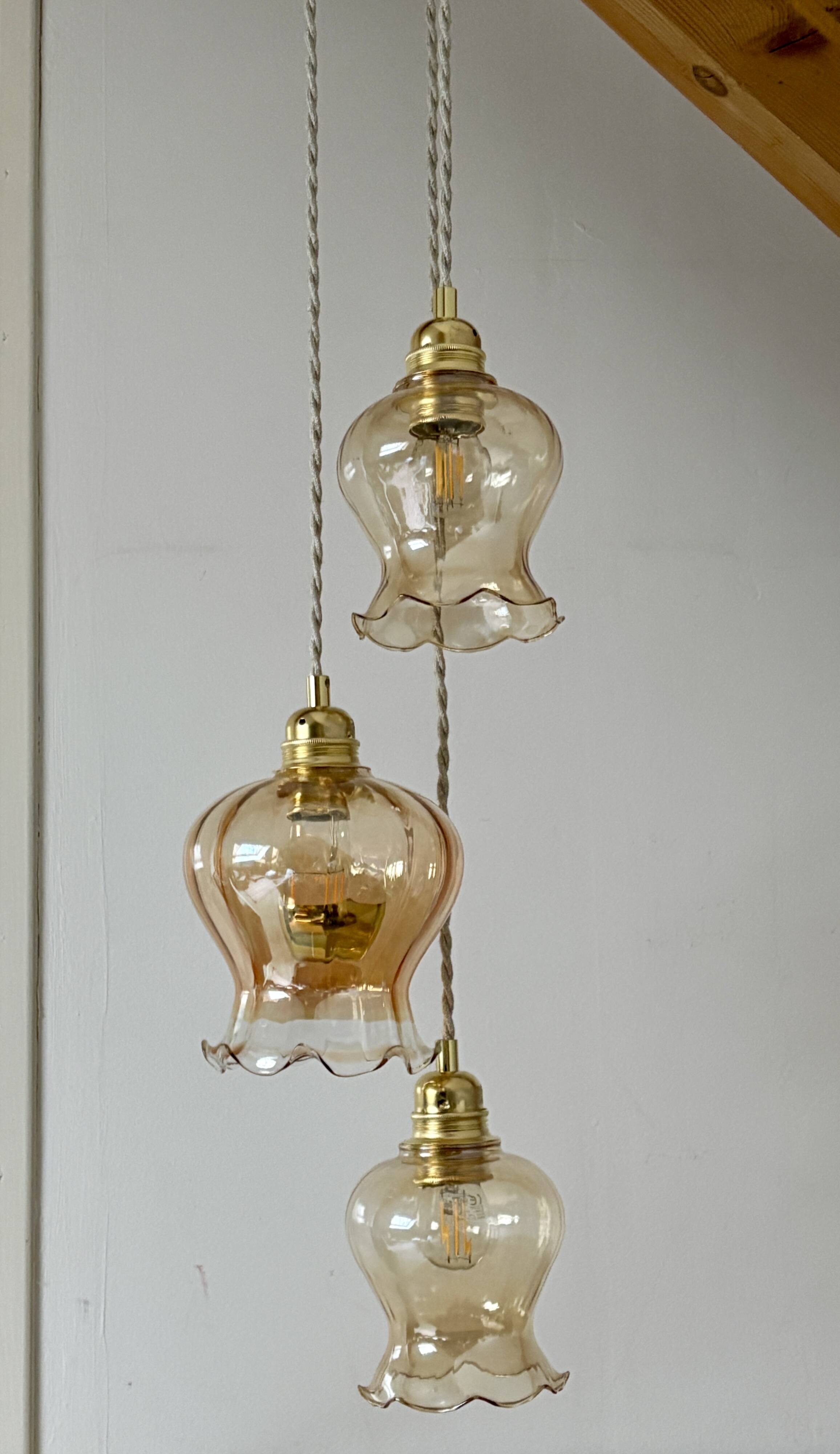 Triple vintage tulip pendant light in amber glass