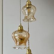Triple vintage tulip pendant light in amber glass