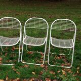 Trio of folding metal chairs