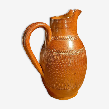 Chiseled terracotta pitcher