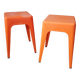 Pair of AMI stools in orange plastic