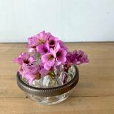 Pique flowers in metal circled glass