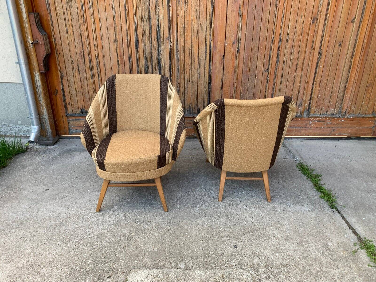 Pair of Mid-Century brown armchairs in beech and upholstery fabric, 1950s.