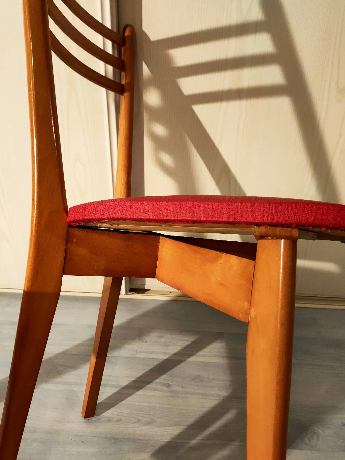 Pair of vintage wooden and leatherette chairs
