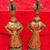 Pair of gilded beaten iron sculpture lamps attributed to Gilbert Poillerat