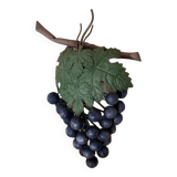 Applies bunch of purple grapes.