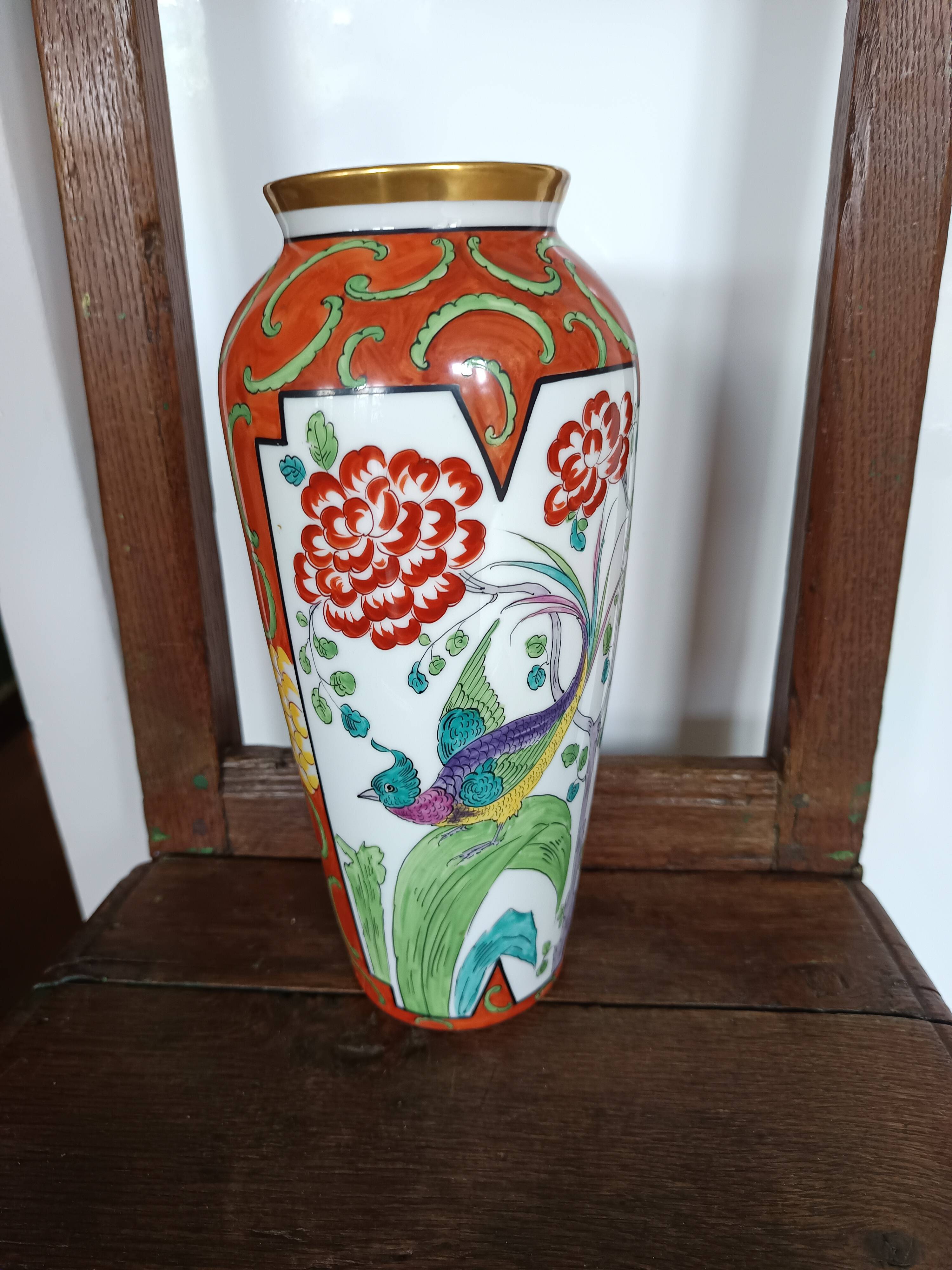 Jean Boyer porcelain vase with floral and vegetal decoration and bird of paradise