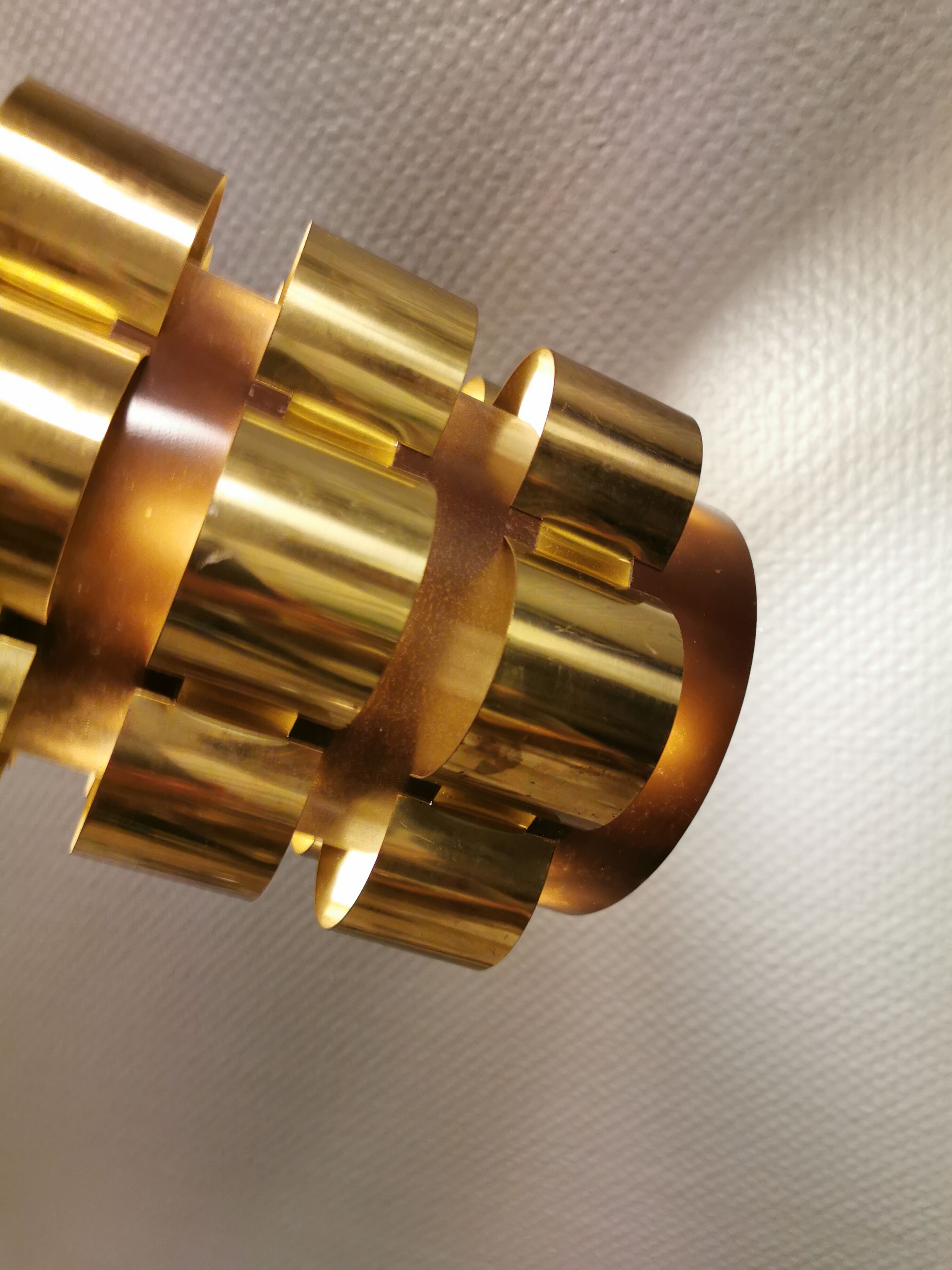 Danish hanging lamp from the 70s, in thin cut metal.