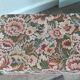 Repose pied tapisserie florale