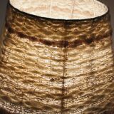 Vintage ceramic lamp with relief and wool shade.