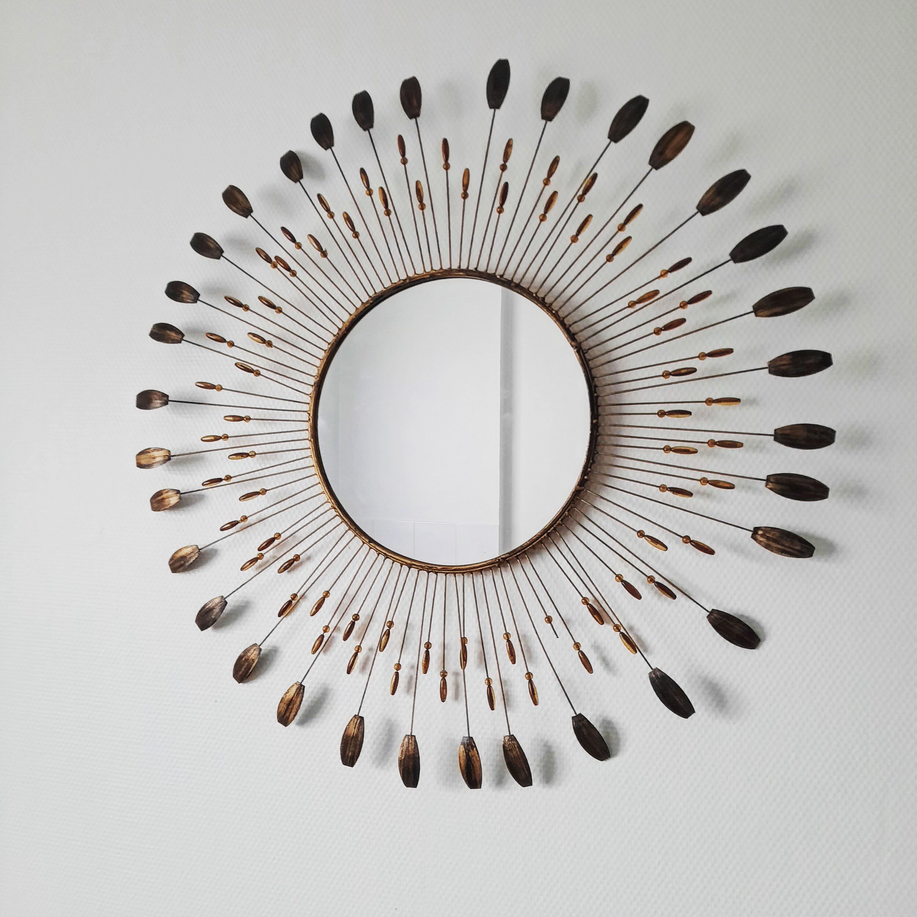 Mirror sun 20th century