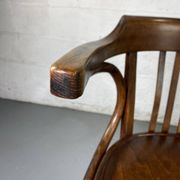 Baumann rotating wooden armchair