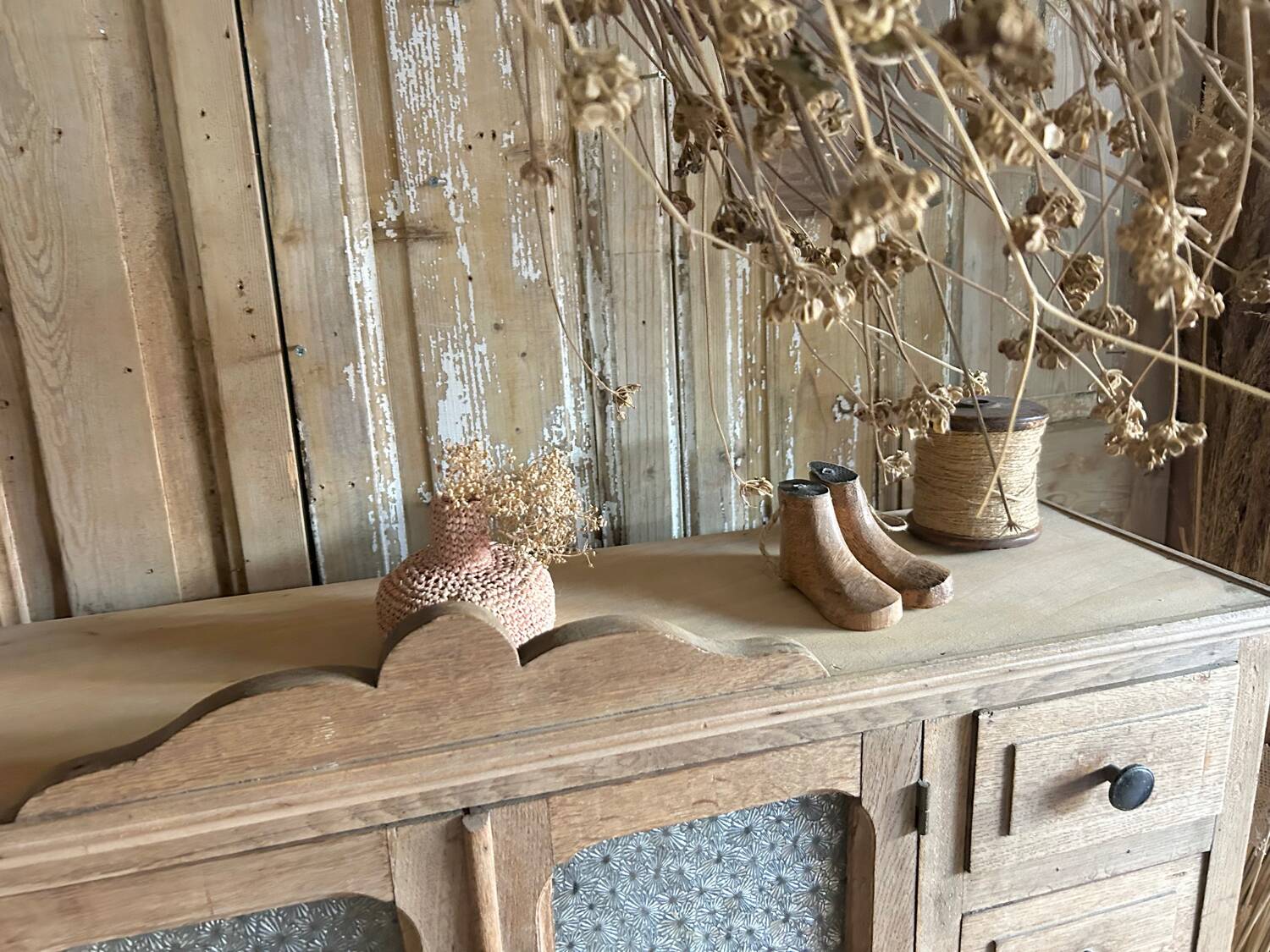 Small piece of furniture with glass doors and drawers