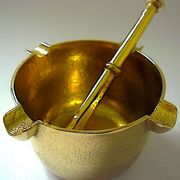 Three "vintage" bronze ashtrays with golden natural patina forming mortars with their drumsticks