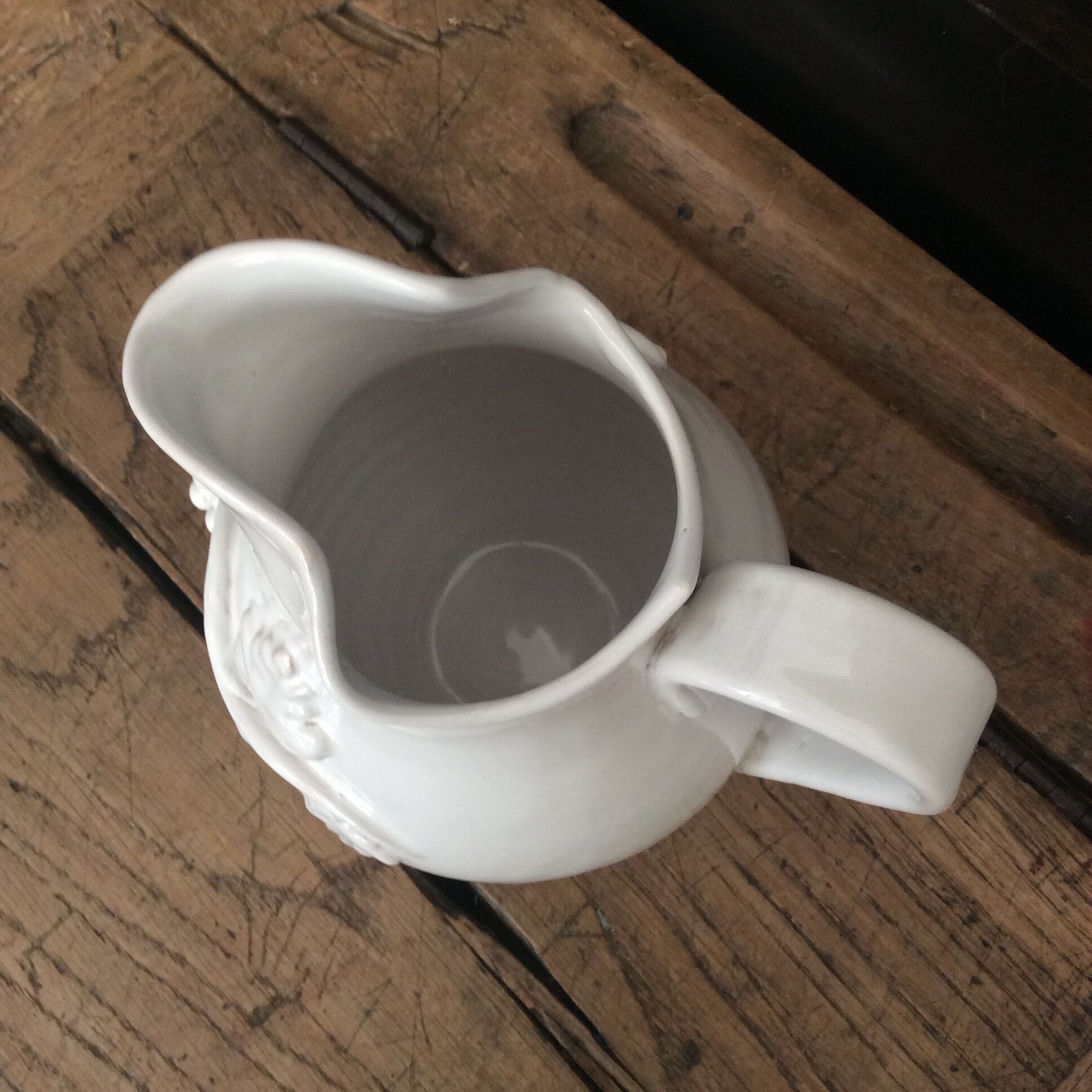 White enamelled ceramic pitcher signed emile tessier malicorne grape bunch