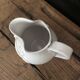 White enamelled ceramic pitcher signed emile tessier malicorne grape bunch