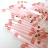 Pink glass wall lamp with garland of pearls